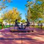 Show Low Founders Bronze Card Player Statue and Festival Marketplace Park