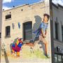 Mural - Colorful Piñatas Chasing a Little Boy