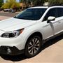 White Subaru Outback